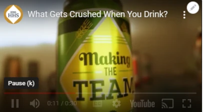 a beer can with the text "Making the Team"