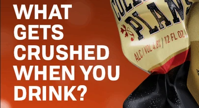 a crushed beer can next to white text on a red background