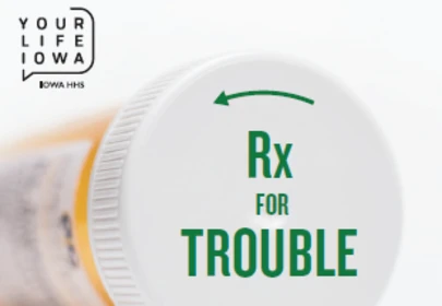 the cap end of a pill bottle with green text