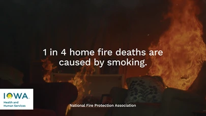 white text over a dark image of a room on fire