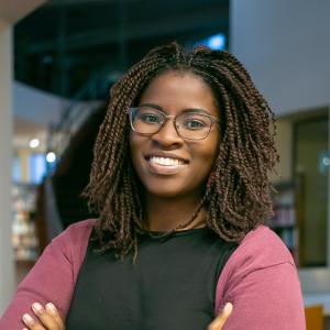 A woman smiling into the camera