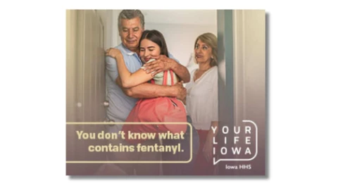 a young girl hugging an older man while an older woman watches, with text related to this campaign
