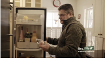 Image of "Dave" in the kitchen with fridge open