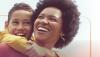 A boy and woman smiling