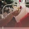 A child pulls a gift out of a stocking