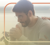 A reassuring arm is placed on a man's sholder